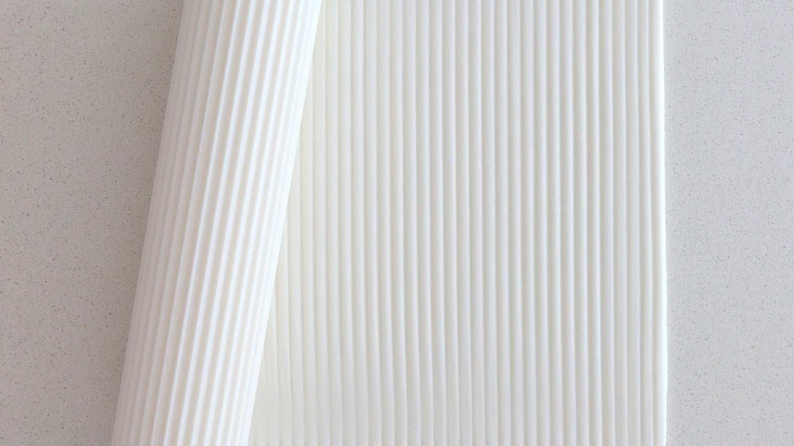 Prop Options Reeded texture rolling pin pressing a clean ridged pattern into fondant