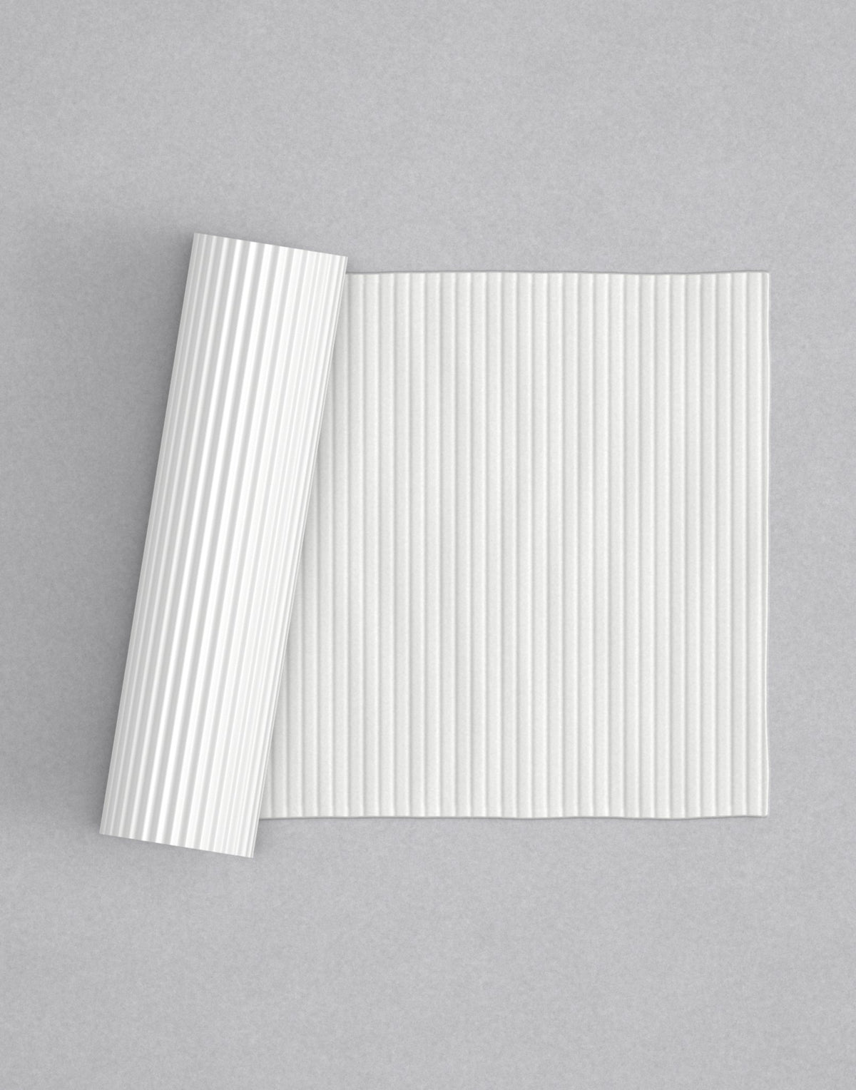 No.11 Reeded mini 4" texture rolling pin with its pattern rolled out on white fondant - Prop Options