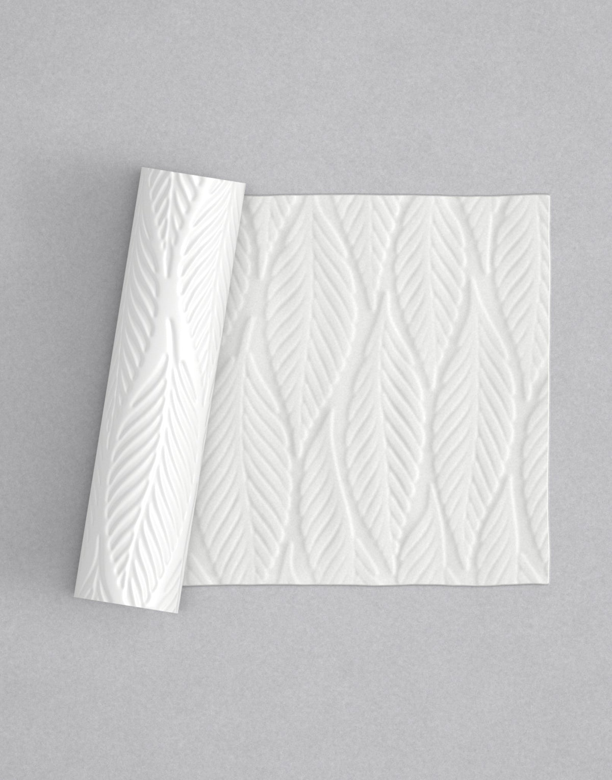 No.22 Palm mini 4" texture rolling pin with its pattern rolled out on white fondant - Prop Options