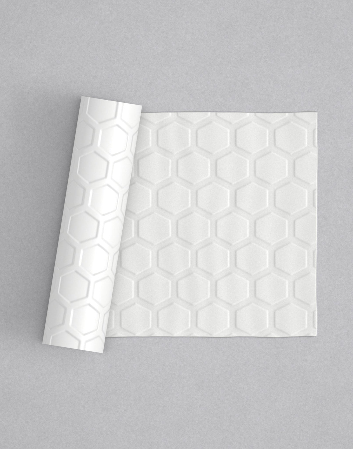 No.30 Honeycomb Geo mini 4" texture rolling pin with its pattern rolled out on white fondant - Prop Options