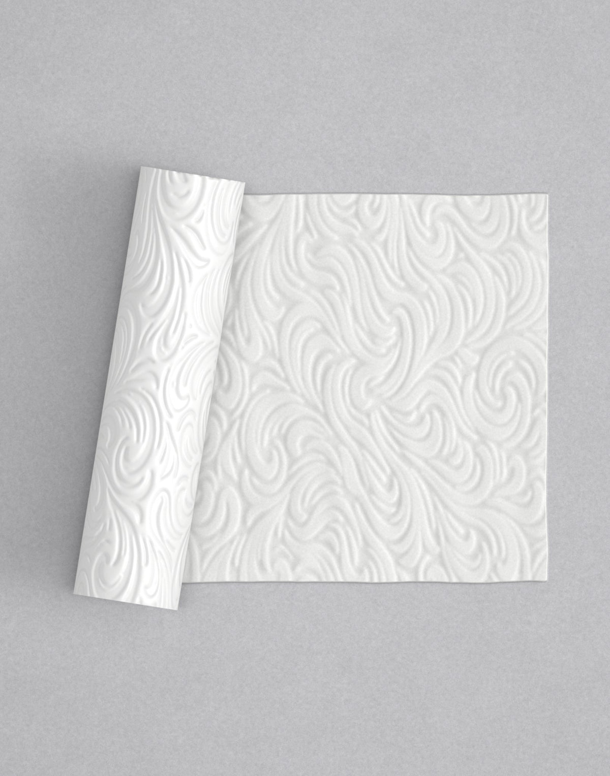 No.40 Rococo mini 4" texture rolling pin with its pattern rolled out on white fondant - Prop Options
