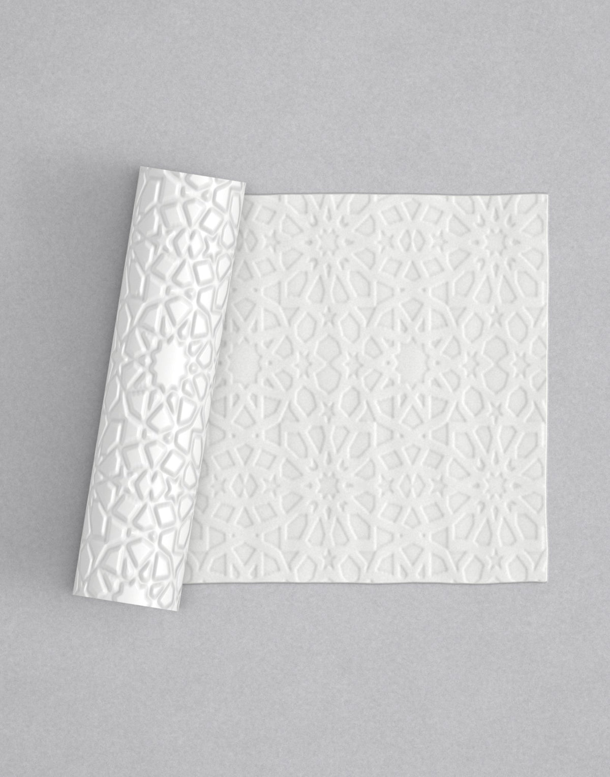 No.47 Nurrah mini 4" texture rolling pin with its pattern rolled out on white fondant - Prop Options