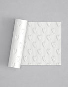 No.73 Hearts mini 4" texture rolling pin with its pattern rolled out on white fondant - Prop Options